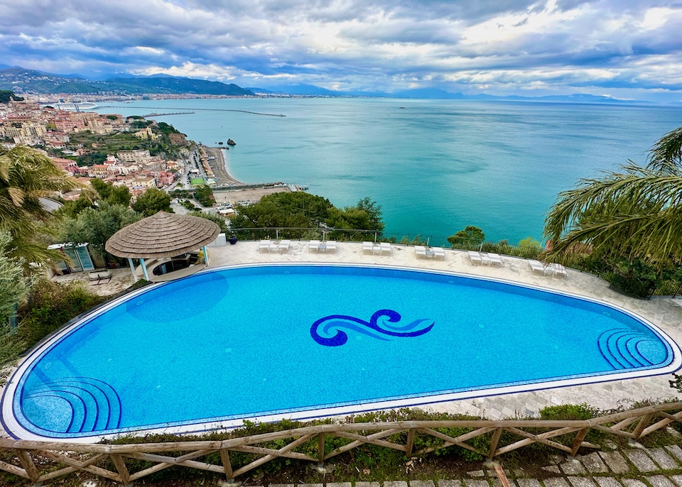 The pool and view over the sea with Vietri sul Mare and Salerno in the background at Hotel Raito in Vietri sul Mare on the Amalfi Coast