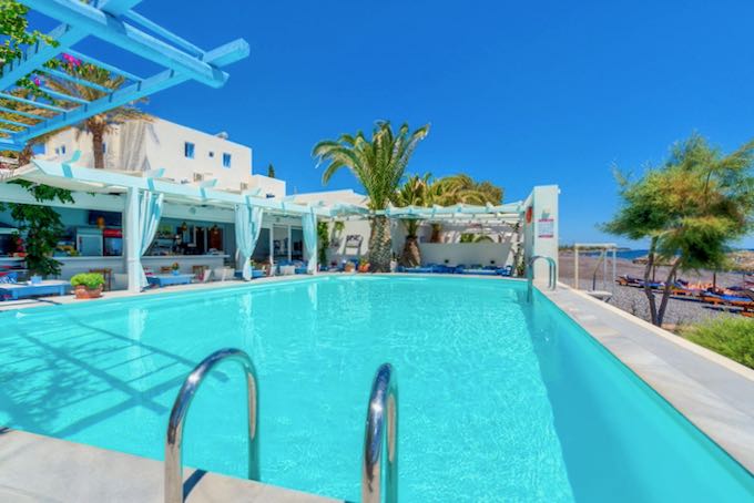 Beach hotel with pool in Santorini.