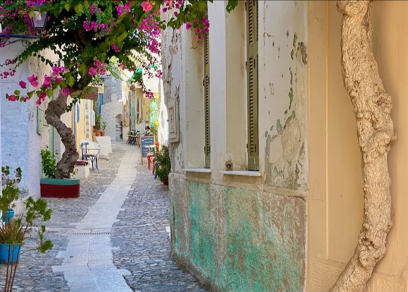 A charming rustic pedestrian lane in Ano Syros, Greece.