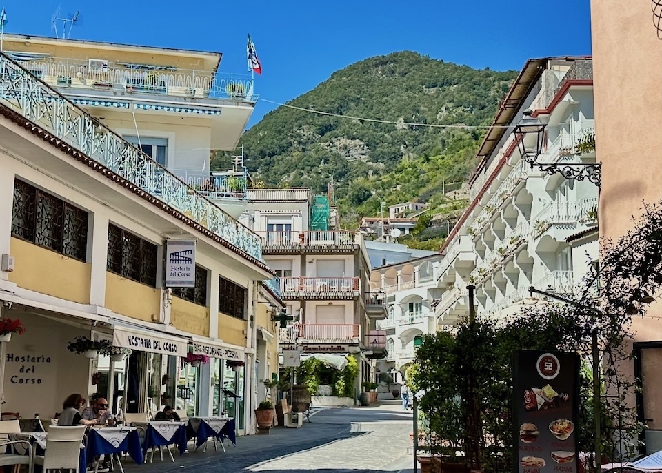 Narrow street lined with hotels and restaurants in Minori on the Amalfi Coast