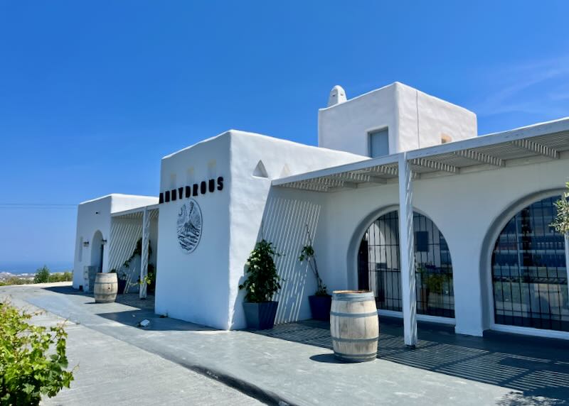 White exterior of a winery in Santorini