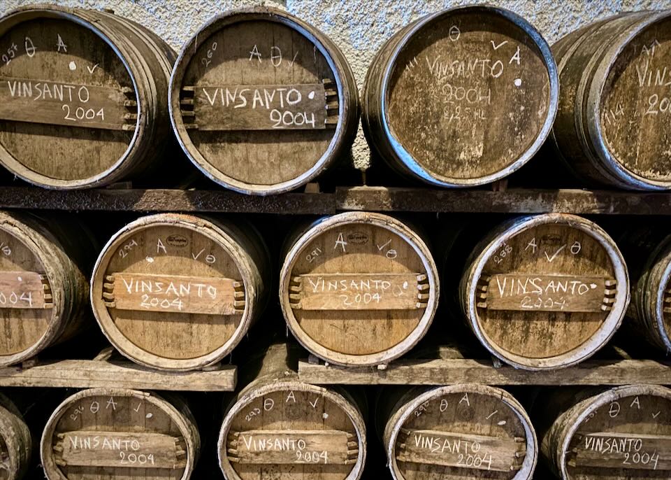 Wine barrels stacked in a cave cellar