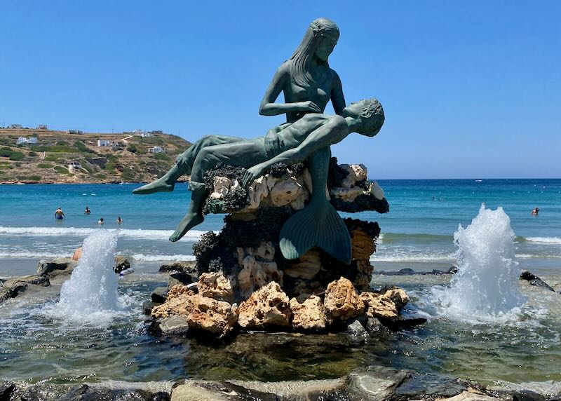 Bronze statue of a mermaid saving a drowned man