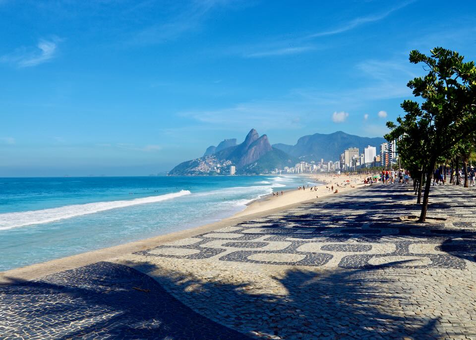 View down the black and white boardwalk down Ipanema Beach in Rio de Janeiro, Brazil.