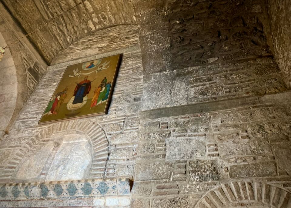 Old stonework inside a small Byzantine church
