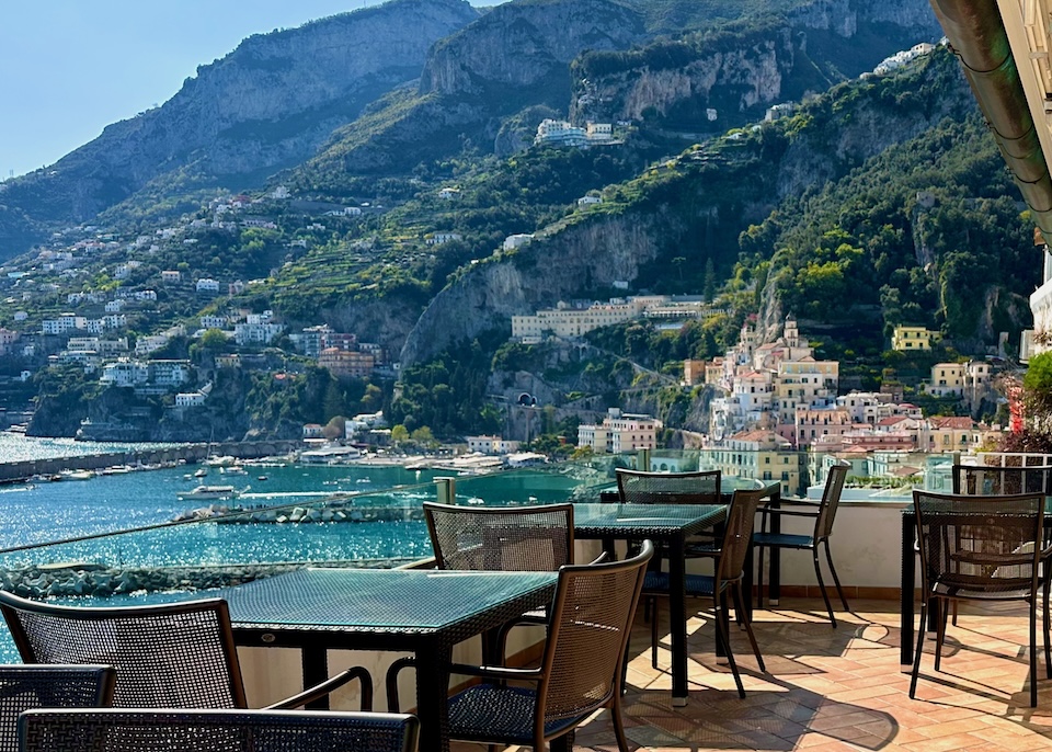 The dining terrace with expansive views of Amalfi and the marina at Hotel Luna Convento