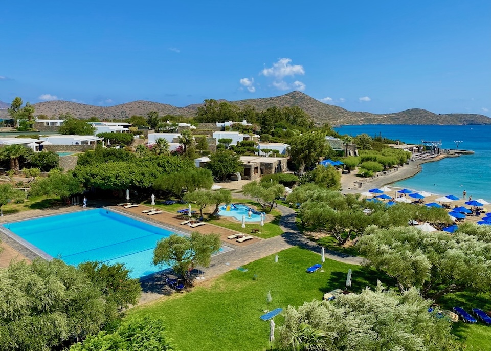 A pool and kids pool behind the beach at Elounda Bay Palace in Crete