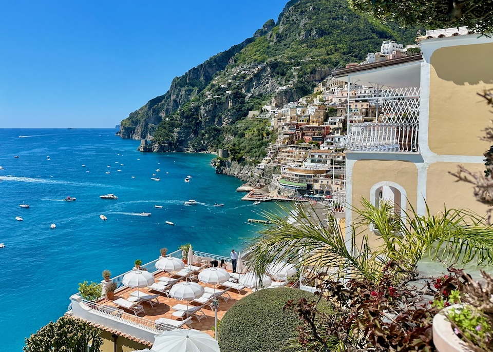 White umbrellas on the sun terrace overlooking the sea at Marincato Hotel in Positano