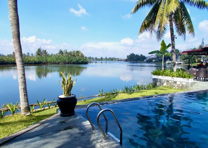 A pool next to a river.