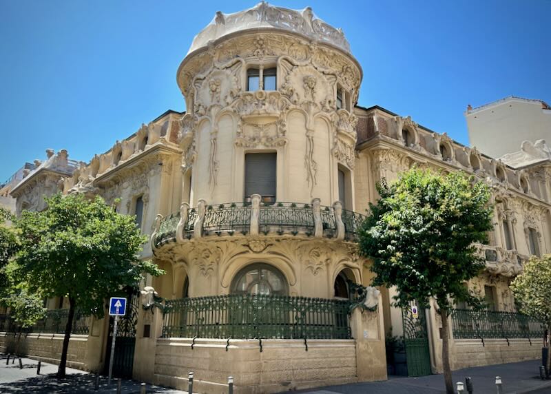 Corner view of an ornate Art-nouveau mansion in Madrid