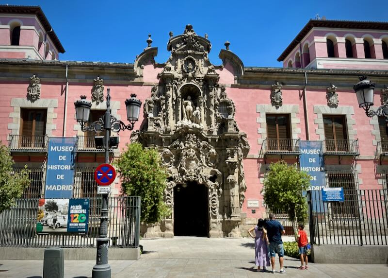 Ornate pink exterior of a museum in Madrid