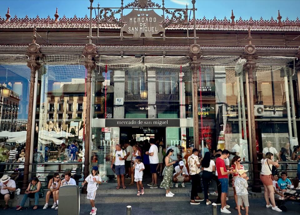 Busy entrance to a popular food market in Madrid