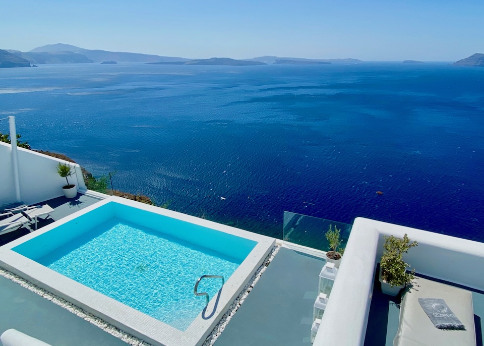 A private infinity pool above the caldera at La Perla hotel in Oia, Santorini.