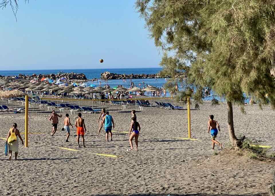 Volleyball on Santorini beach.