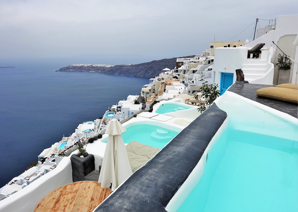 Three private plunge pools on different terraces overlooking the caldera and Oia at Sophia Luxury Suites in Imerovigli, Santorini.