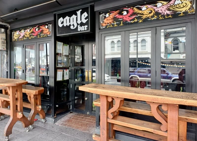 A bar with outdoor tables.