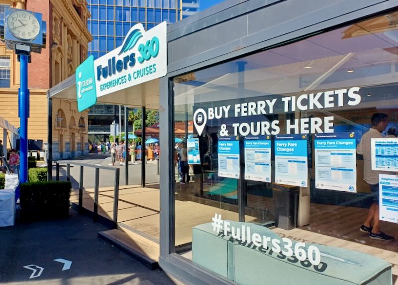 A store front with ferry and boat tours.