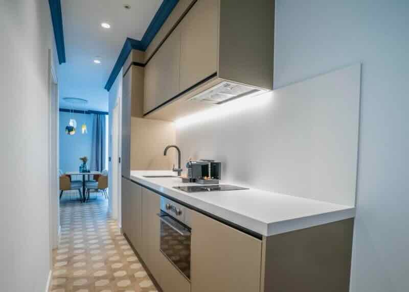 View of a galley kitchen in a rental apartment