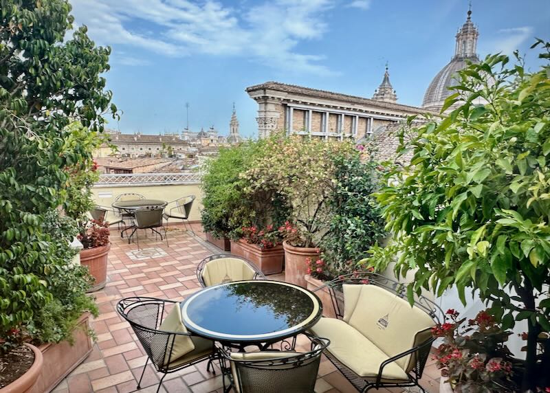 Furnished rooftop balcony with views over Rome 