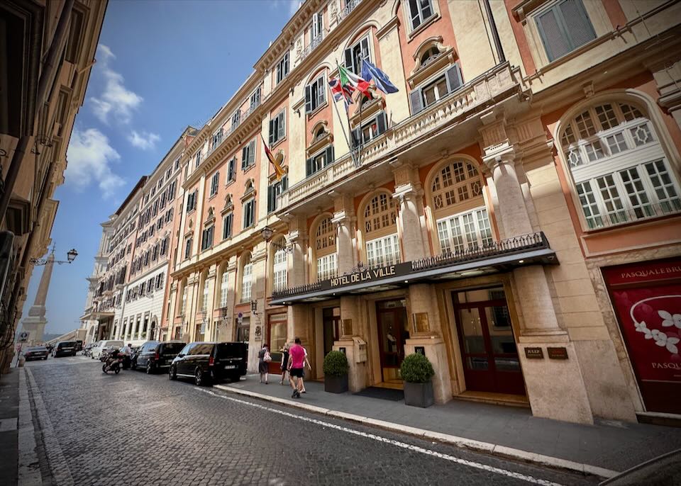 View looking down the street in front of the Hotel de la Ville in Rome toward the Obelisk at the top of the Spanish Steps.