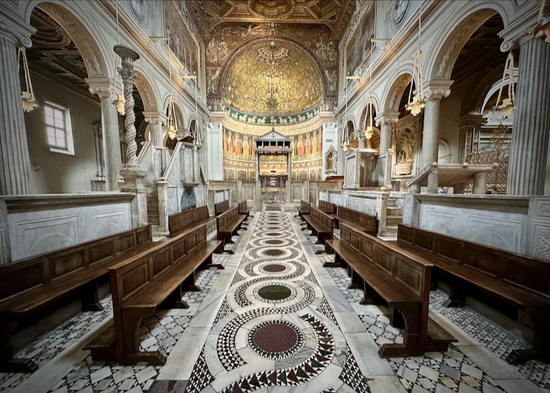 Church interior with ornate tilework and mosaics