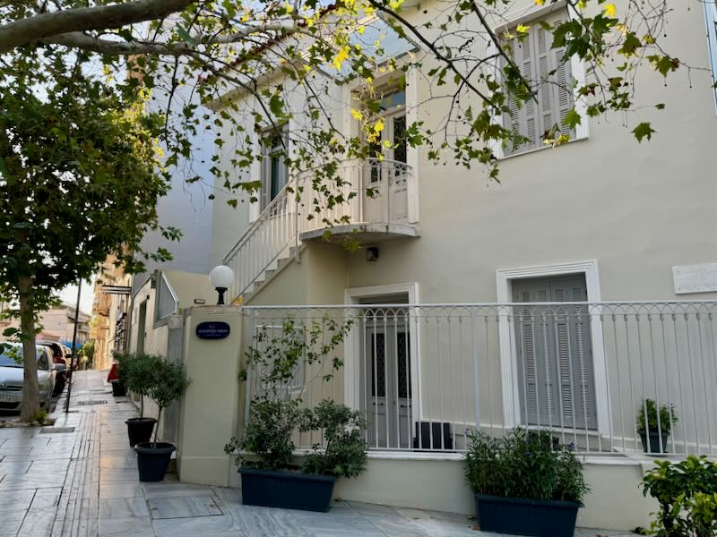 Neoclassical mansion-turned-hotel on a quiet Athens street