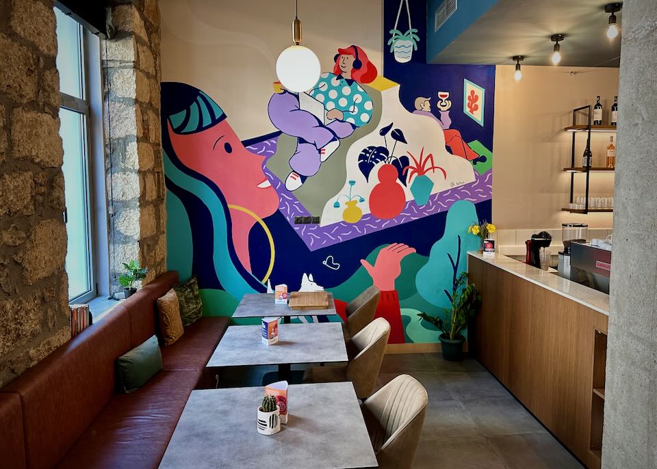 Colorful mural in the breakfast room of a boutique hotel.