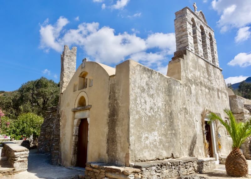 Bell tower and dome of Panagia Drosiani church in Moni, Naxos