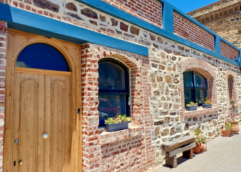 A door to a brick building.