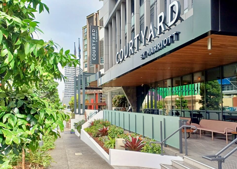 The outside entrance of the Courtyard Marriott hotel.