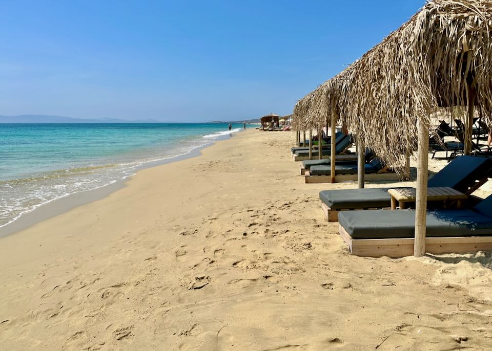 Beach beds at Yucca Beach Club at Athina Suites on Plaka Beach.