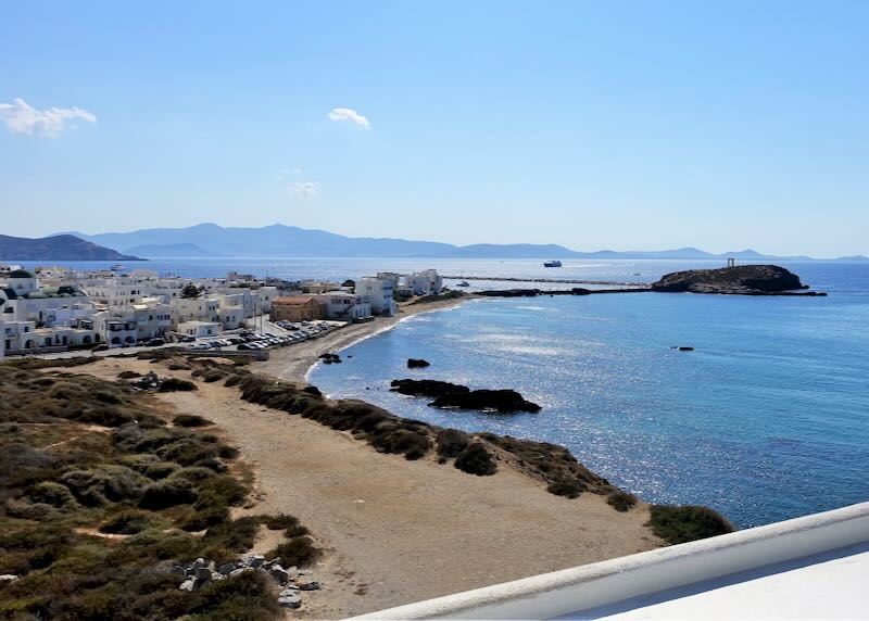 View of Naxos Town and the Temple of Apollo ruins from the Grotta Beach area in Naxos