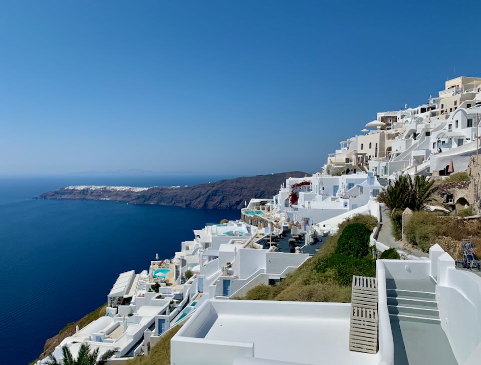 View of hotels spilling down the cliifside in Imerovigli village on Santorini.