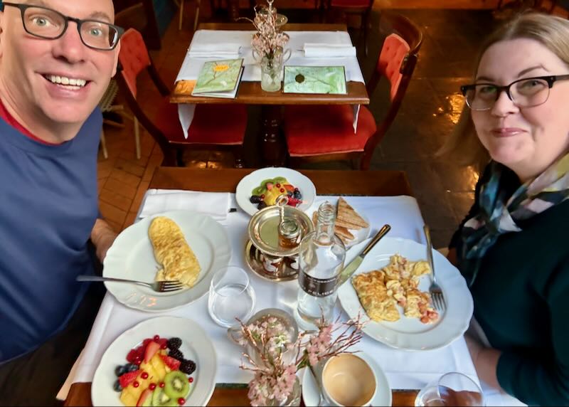 My wife and I having breakfast at our hotel in Florence.