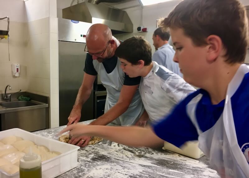 Me and my kids doing a pizza making class in Florence.