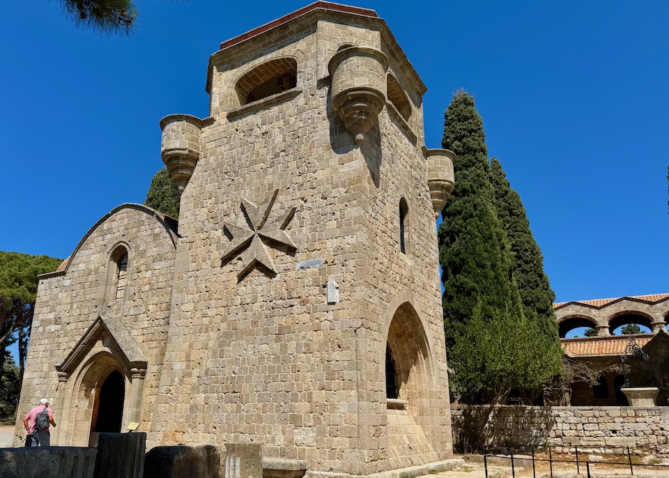 The Gothic-style, stone exterior of Filerimos Monastery in Ialyssos, Rhodes.