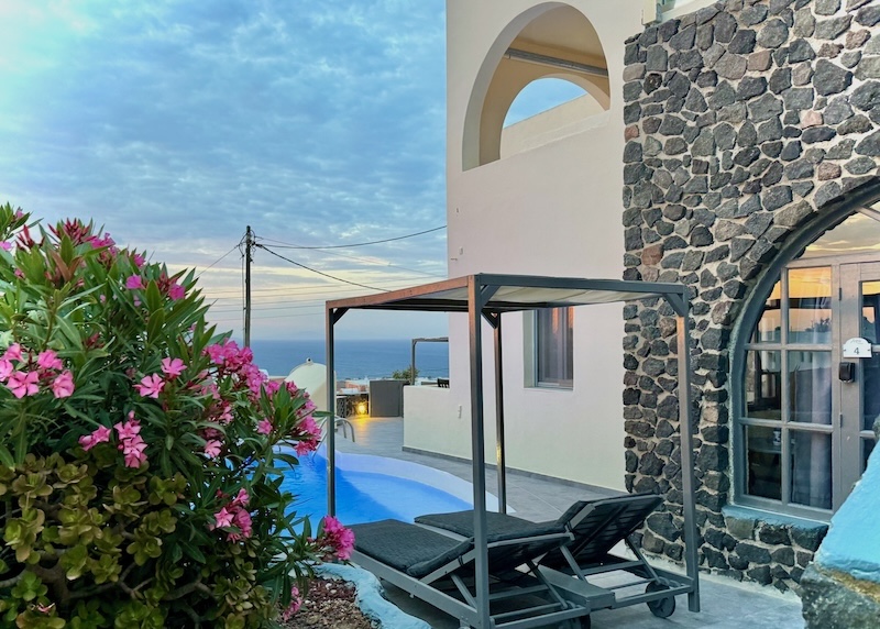 View of the pool and patio of Aspa Villas in Oia, Santorini.