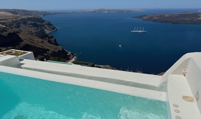 View from a private jacuzzi overlooking the caldera and volcano at Villa Murat in Fira, Santorini.