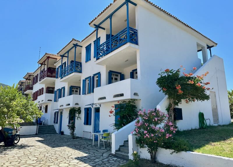 Traditional and well-kept Greek hotel with bright blue woodwork