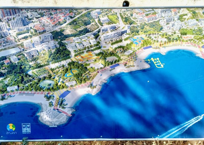 A poster of a mock-up of a beach area with new play zones.