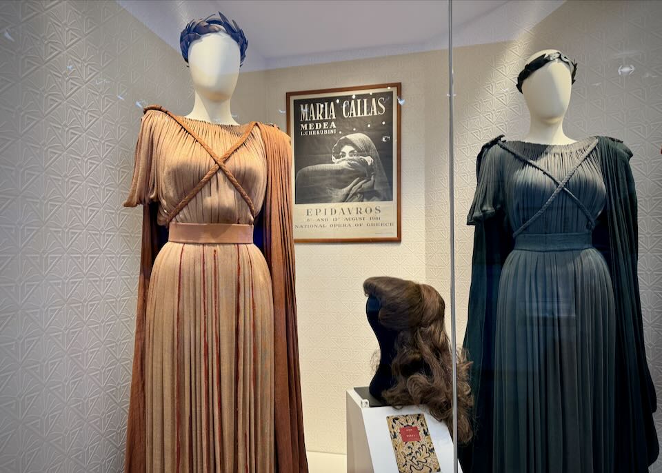 Museum display case with costumes from performances by Maria Callas.