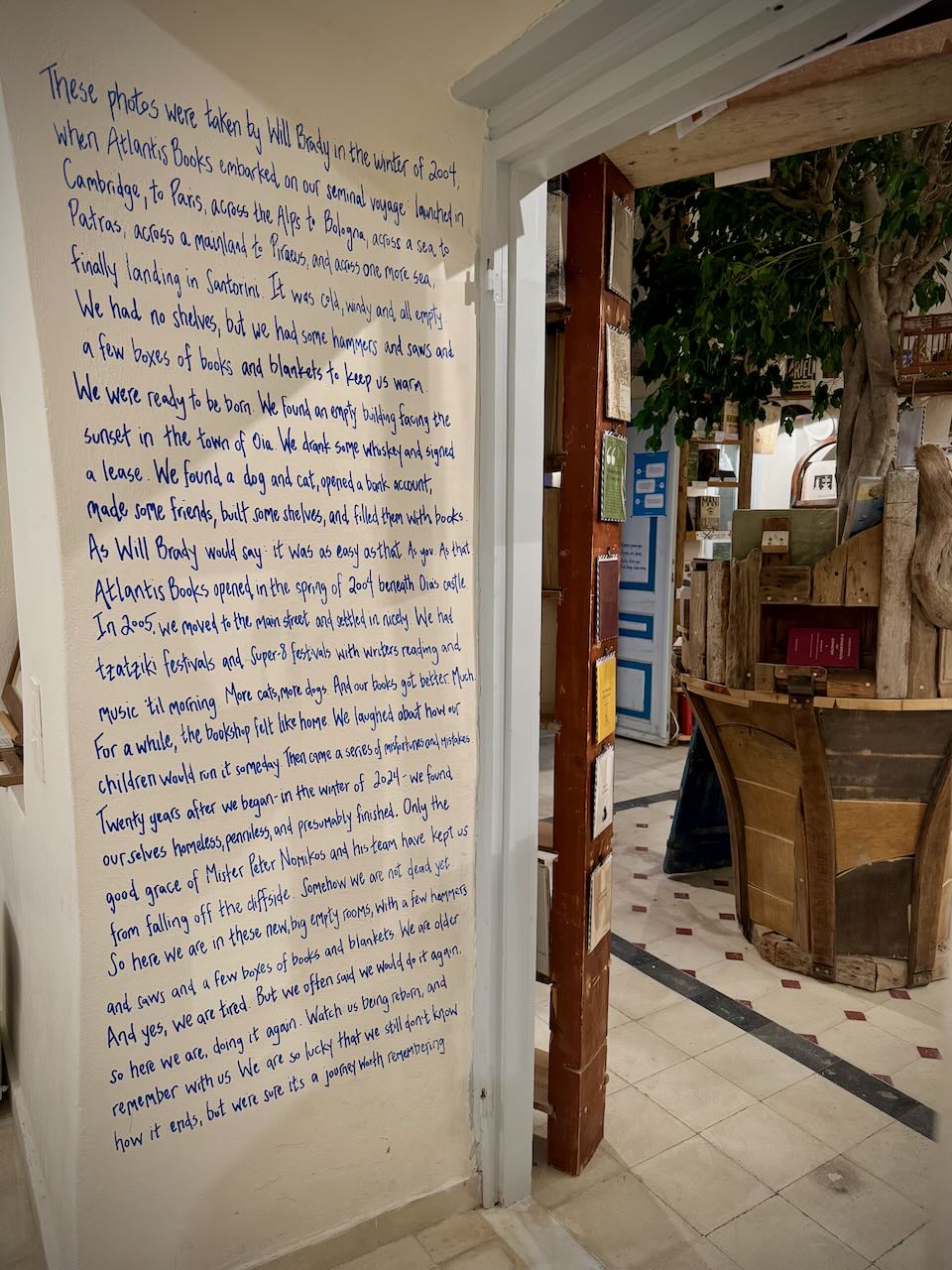 Bookstore wall hand-painted with the story of the history of the shop.
