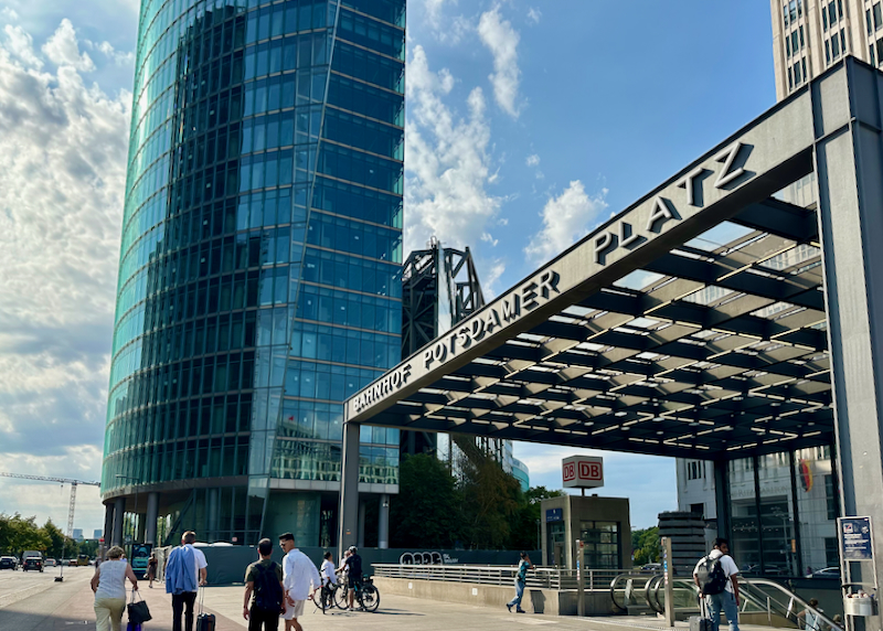 View of the entrance to the Potsdamer Platz metro station and a nearby skyscraper