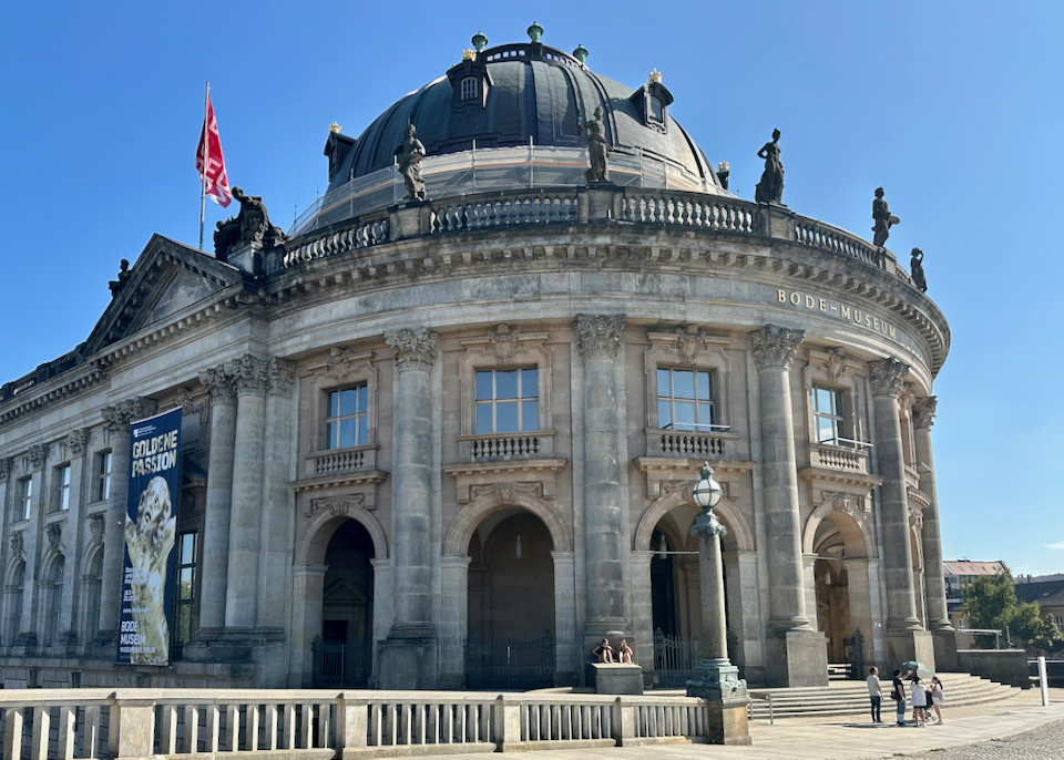 Exterior of Berlin's Bode-Museum, with people lounging in front