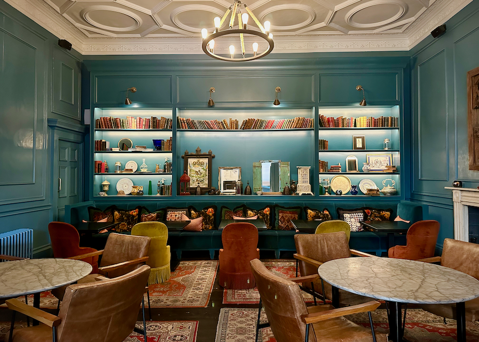 Hotel library with cozy seating nooks