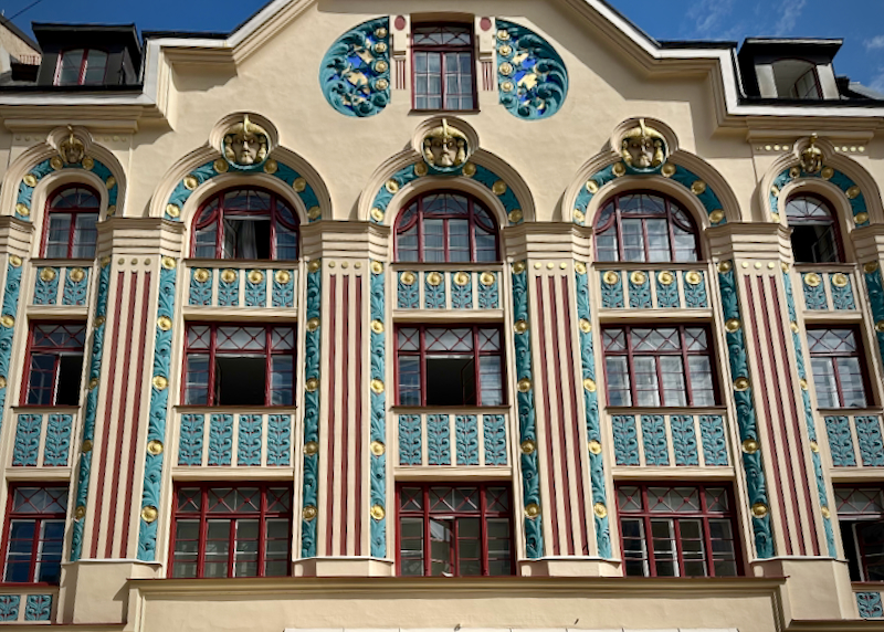 Building exterior with colorful art nouvean details.