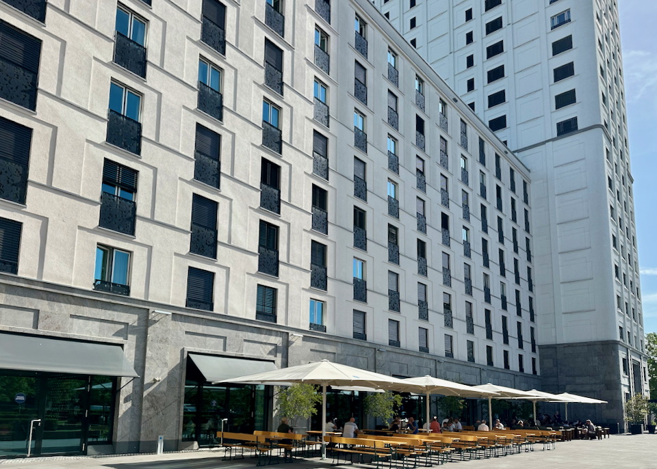 Exterior of a large, boxy, modern hotel building 