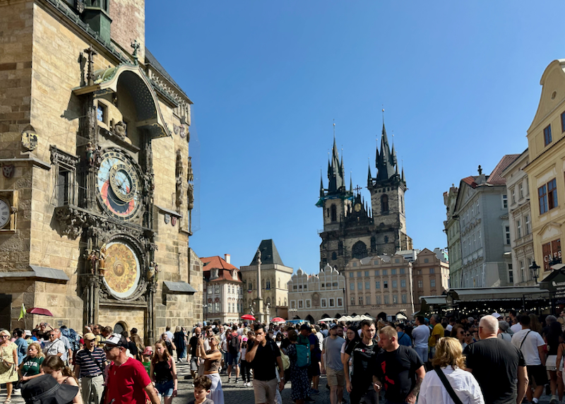 Astronomical clock in Old Town Prague, with the Gothic Church of Our Lady before Týn in the background.