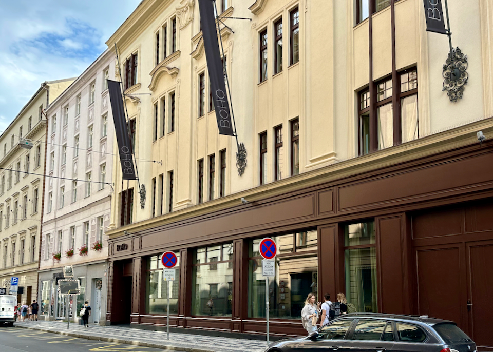 Exterior of a hotel with polished wood siding and large windows