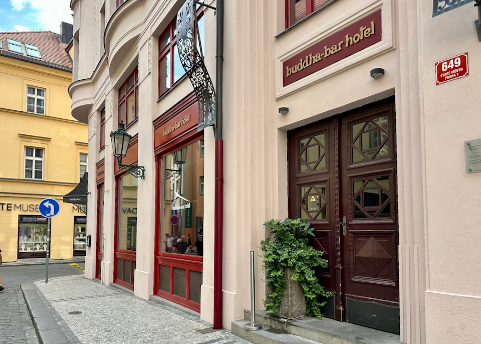 Peach colored exterior of Buddha Bar hotel in Prague 